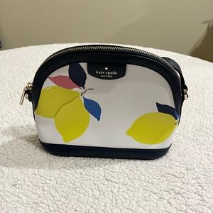 Used Kate Spade leather “Sylvia” Lemon Zest Dome Crossbody Bag.